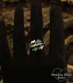 Braided twig and leaves emerald ring, Unique emerald branch ring, Women's nature ring, Leaves emerald ring, Branch white gold ring, Leaf ring ■■ All my rings are only crafted with the finest of recycled metals DETAILS: Stones - Natural Emerald, total weight approx. 0.012ct. Metal - 14k solid White gold (Yellow or Rose gold at your request) Dimensions - width 12mm (0.47 in.), band width - 1,5mm (0.059 in.) Finish - shiny and black rhodium (shiny at your request) Please choose your ring size and g Nature-inspired Green Emerald Ring For Anniversary, Nature-inspired Green Emerald Anniversary Ring, Nature-inspired Green Wedding Ring, Emerald Ring Unique, Gold Tree Branches, Tree Branch Ring, Gold Twigs, Branch Engagement Ring, Leaves Ring