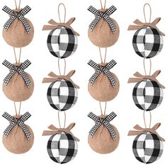 six ornaments with black and white plaid bows hanging from the front, each ornament shaped like a ball