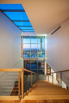 The leaning levels of this stunning Hamptons house bring residents closer to the water, allowing for spectacular views from every angle. Mixed materials diversify the design, making every inch an architectural sight to be seen. Designed by Barnes Coy Architects in 2012. Hamptons House, The Hamptons, Architects, Stairs, Bring It On, Architecture, Water, Home Decor, Design