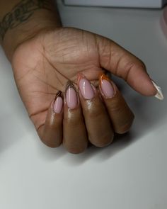 Fall nudes 🍁 #dovenailsbysharon Stilleto Almond Nail Shape, French Tip Different Color Nails, Fall Nail Acrylic Designs, Pink And Gold Almond Nails, Almond Nails Fall Design, French Tip Short Almond Nails, Fall Almond Nails Designs, Nude Almond Nails With Design, Fall Minimalist Nails