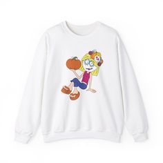 Description: Rediscover the charm and whimsy of Lizzie McGuire with a festive twist! Our exclusive Halloween Candy Skull Lizzie McGuire cartoon sweatshirt is the perfect blend of nostalgia and Halloween fun, making it a must-have addition to your festive wardrobe. Product Details: Design: Our sweatshirt features a unique cartoon illustration of Lizzie McGuire painted as a candy skull, capturing her playful spirit and Halloween flair in every detail. This design pays homage to the beloved charact Playful White Sweatshirt With Character Print, Fun Cartoon Print Sweatshirt, White Cartoon Tops With Character Print, White Cartoon Style Tops With Character Print, White Cartoon Character Print Tops, Lizzie Mcguire Halloween, Candy Skull Art, Lizzie Mcguire Cartoon, Nostalgic Halloween