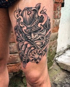 a man with a tattoo on his leg