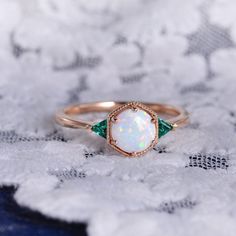 Dainty Opal Ring Opal Stacking Ring 14k Bridal Promise Anniversary Gift Valentina's day Gift Delicate Opal Ring Bridesmaid Gift For Wife *Primary Stone: Opal *Primary Stone Creation: Lab Created *Stone Color: White *Stone Shape: Round *Stone Size: 6mm Secondary Stone: Emerald Secondary Stone Shape: Triangle Secondary Stone Color: Green Secondary Stone Size: 3mm Features: * Handmade * Center Stone Opal * Brand New * All Ring Sizes Available * Suitable For Every Day * 14k Solid Gold / 18k Solid Go Opal Engagement Ring Rose Gold, Opal Stacking Ring, October Birthstone Ring, Smaragd Ring, Emerald Ring Vintage, October Birthstone Rings, Ring Opal, Vintage Inspired Jewelry, Opal Engagement