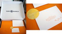 a box containing a gold coin and some papers