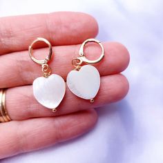 Real mother of pearl hoop earrings, made of pearls in heart shape, 15mm size beads and stainless steel, gold plated hoop earrings . 📮FREE SHIPPING WORLDWIDE.  💚 CARE OF JEWELLERY: keep it dry at all times,  No contact with water or any liquids.  Pearls are beautiful stones, you can wear those earrings with any outfit, and you'll look just amazing and sophisticated..despatched in one working days, comes in a beautiful velvet pouch, ready to be gifted as a birthday gift or a Christmas gift for women. for matching bracelet, please visit : https://www.etsy.com/listing/1535998267/heart-shaped-pearl-bracelet-freshwater It's a perfect gift for yourself or your loved ones as a birthday gift or as a Christmas present  😍 Please follow us on social media : https://www.instagram.com/ivylilyjeweller Heart-shaped Pearl Jewelry For Gifts, White Heart-shaped Pearl Earrings Gift, Heart-shaped Pearl Earrings For Gifts, Heart-shaped Pearl Earrings For Anniversary On Valentine's Day, Silver Heart-shaped Pearl Earrings For Valentine's Day, Heart Hoop Earrings, Gold Pearl Earrings, Pearl Hoop Earrings, Christmas Gift Jewelry