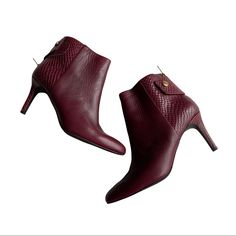 Cole Haan Claremont Shootie Casual Boot Dress Shoe Ultra-Luxe Claremont Bootie Leather Upper Back-Zip Closure W Signature Logo Hardware Almond Toe Leather Lining Padded Footbed Wrapped Heel Rubber Outsole Heel Height: 3 1 4 In. Color: Zinfandel Very Hard Color To Find! Elegant Burgundy Ankle Boot Heels, Elegant Burgundy Ankle-high Boots, Elegant Burgundy Boots For Workwear, Elegant Burgundy Boots For Work, Elegant Burgundy Workwear Boots, Booties Dress, W Signature, Zinfandel, Wrap Heels