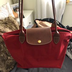 Never Used Perfect Conditions Longchamp Le Pliage Red Outfit, Classic Red Shoulder Bag With Leather Handles, Red Shopping Bag With Snap Closure, Red Bags With Snap Closure For Shopping, Everyday Red Shoulder Bag With Snap Closure, Red Shoulder Bag With Snap Closure For Everyday, Casual Red Bag With Snap Closure, Everyday Red Bag With Snap Closure, Red Everyday Bag With Snap Closure