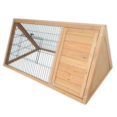 a large wooden bird cage with two doors