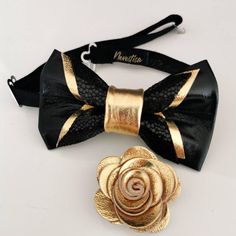 Check out this item in my Etsy shop https://www.etsy.com/listing/1349079280/elegant-suit-black-and-gold-mens-bow-tie Black Tux With Gold Bow Tie, Formal Gold Suit And Tie Accessories With Decorative Bow, Gold Bow Suit And Tie Accessories For Wedding, Gold Bow Tie Accessories For Wedding, Black And Gold Bow Tie, Pink Prom Suit, Gold Satin Bow Tie For Black-tie Events, Boys Prom Suits, Tom Ford Bow Tie