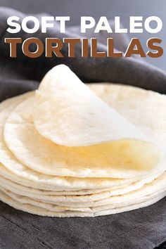 there is a stack of tortillas on top of a cloth with the words, soft paleo tortillas