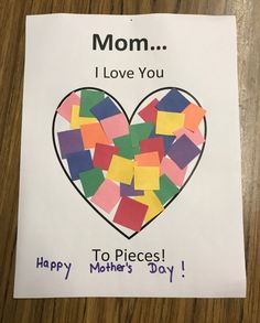 a mother's day card with a heart made out of pieces of colored paper