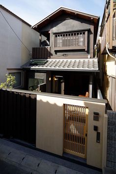 a house with a gate in front of it