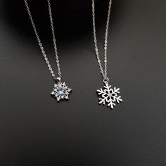 Sterling Silver Snowflake Jewelry With Blue CZ Crystal Center Stone. These exquisite sterling silver snowflake necklaces are perfect gift for the special someone in your life. Stunningly crafted, these are sure to be a hit for anyone looking for an extra special piece of jewelry that is unique and hypoallergenic. Perfect for stocking stuffer for the Christmas season. Material: solid sterling silver, or platinum plated on top of the sterling silver, cubic zirconia. Size of Charm: 12.5mm x 15mm with blue CZ crystal center stone. 15.5mm in Plain Sterling Silver with tiny CZ crystal center stone. Comes with gift box ready for gift giving. Unstoppable Love Aqua Marine Snowflake Necklace Zales, Snowflake Jewelry, Winter Necklace, Snowflake Necklace, Silver Snowflakes, Christmas Season, Cz Stone, Stocking Stuffer, Charm Necklace