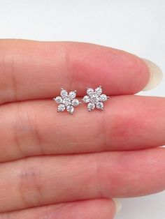 925 Sterling Silver Cz Flower Stud Earrings - Metal: 925 Sterling Silver (Finish: Rhodium Plated) - Stone: Clear Cubic Zirconia, Round, Prong - Shape: Flower - Dimension: 6mm(0.24 in) x 1.5mm - Closure: Post at Side, Push Back - Color: Silver Flower-shaped Cubic Zirconia Diamond Earrings With Accents, Diamond White Flower Earrings For Anniversary, Diamond White Brilliant Cut Flower Earrings As Gift, Classic Flower-shaped Cubic Zirconia Earrings, Gift Diamond Flower Earrings With Brilliant Cut, Sterling Silver Flower-shaped Earrings With Brilliant Cut, Silver Flower-shaped Earrings With Diamond Accents, Diamond White Flower Earrings With Cubic Zirconia, Sterling Silver Brilliant Cut Flower Earrings