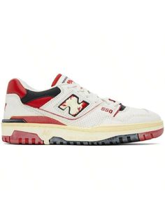 New Balance 
White & Red 550 Sneakers 
Low-top buffed leather and mesh sneakers in white, red, and black. 
. Perforated detailing and smudging throughout 
. Lace-up closure 
. Logo patch at padded tongue 
. Padded collar 
. Logo appliqué at sides 
. Logo embossed at heel counter 
. Buffed leather lining 
. Logo embossed at textured rubber midsole 
. Treaded rubber sole 
Supplier color: Sea salt/Team red/Black 
Upper: leather. Sole: rubber. 
Made in Viet Nam. 
241402M237114 
White & Red 550 Sneak Casual Athletic Shoes, New Balance White, Team Red, Mesh Sneakers, Casual Athletic, Outdoor Shoes, Sea Salt, Low Top, Patch Logo