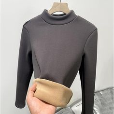 Category:T-shirt; Season:Fall,Winter; Fabric:Polyester; Sleeve Length:Long Sleeve; Look After Me:Machine wash; Gender:Women's; Style:Casual; Elasticity:Micro-elastic; Tops Type:Tunic; Occasion:Daily; Details:Fleece lined; Top Length:Regular Tops; Fit Type:Regular Fit; Pattern:Solid Color; Neckline:Turtleneck; Listing Date:09/30/2024 Gray Plain Winter Tops, Winter Plain Gray Tops, Plain Gray Winter Tops, High Stretch Gray Top For Winter, High Stretch Gray Tops For Winter, Gray Plain Tops For Winter, Non-stretch Gray Top For Winter, T Shirt Long Sleeve, Snow Wear