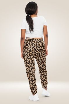 Looking for a trendy and functional addition to your workout wardrobe? Look no further than these Leopard Print Track Pants! These pants are the perfect blend of style and performance, featuring a lightweight, water-resistant fabric and a fully lined mesh interior for optimal comfort during any workout. The relaxed fit and elastic waistband with ankle cuffs provide the perfect fit, while the zip pockets allow you to safely store your essentials. These pants sit at the hip and are ideal for styli Workout Wardrobe, Party Kleidung, Ankle Cuffs, Water Resistant Fabric, Workout Gear, Track Pants, Leopard Print, Zip Pockets, Perfect Fit