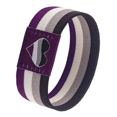 a purple, white and black striped bracelet with an arrow on the front of it