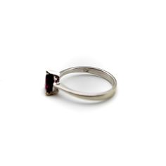 This is part of Chairish’s Fine Jewelry assortment.  This 18k white gold ring features a beautifully coloured heart-shaped garnet. The garnet is a saturated deep magenta, with facets that sparkle in many different hues of pink and red. It is prong set with three prongs; the back of the carriage or underside of the ring is a heart shape as well, for an adorable added touch. A wonderful sweetheart ring , this is the perfect gift to show someone your love or your self love.  The rings weighs 2.9 gr Elegant Heart-shaped Amethyst Ring, Garnet Brilliant Cut Ring As Gift, Elegant Amethyst Heart-shaped Birthstone Ring, Formal Heart Cut Birthstone Ring For Valentine's Day, Classic Heart-shaped Ruby Ring For Formal Occasions, Classic Solitaire Heart Ring For Formal Occasions, Classic Heart-shaped Ruby Ring, Heart Shaped Solitaire Ring For Formal Occasions, Classic Formal Heart Solitaire Ring