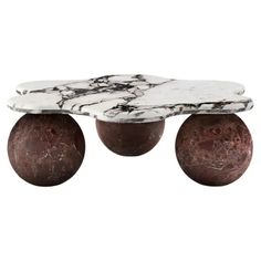 three marble balls sitting on top of each other