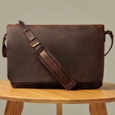 The Leather Messenger Bag for Men is a handmade bag designed to be the perfect daily companion for any man. Made of top-quality leather, the  briefcase laptop bag with some vintage look ensures the bag will last for years to come. The messenger bag comes in two sizes, with measurements of 13.75" x 9.75" x 2.3" (Small) and 15.3" x 11.75" x 2.9" (Large), making it capable of carrying a 13"-16" laptop. The adjustable shoulder strap is convenient to carry and can be adjusted from 43"-50" (110-127 cm Leather Laptop Bag For Men, Mens Work Bags, Mens Leather Laptop Bag, Crossbody Laptop Bag, Messenger Bag For Men, Leather Messenger Bag Men, Laptop Bag Men, Mens Crossbody Bag, Neuer Job