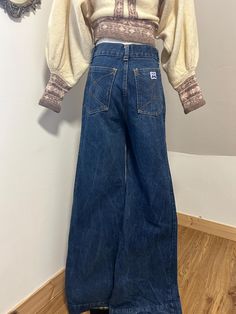 1970s perfect worn in thick denim flares , by brand 'Mashe' , 100% cotton. The stitching on the back pocket is coming off, otherwise in great condition - you could take the stitching out. Best fit a UK 8, see measurements below waist 28" hip 17" flat rise 11" length 31" #vintage #70s #1970s #60s #flares Retro Mid-rise Cotton Flare Jeans, Retro Flare Cotton Jeans, Vintage Denim Flare Jeans For Fall, Vintage Medium Wash Flare Jeans For Fall, Retro Denim Blue Cotton Flare Jeans, Vintage Five Pocket Jeans For Fall, Vintage Jeans For Fall With Five Pockets, Vintage Cotton Flare Jeans For Fall, Vintage Style Cotton Flare Jeans For Fall