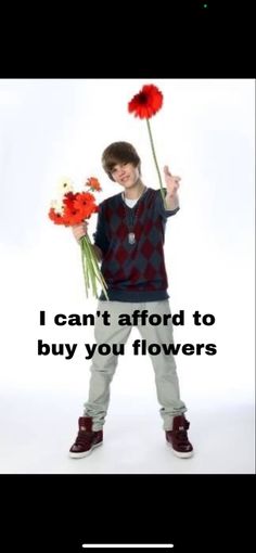 a boy holding flowers with the caption i can't afford to buy you flowers