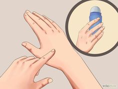 two hands are holding a blue bottle in front of a mirror with the reflection of someone's hand on it