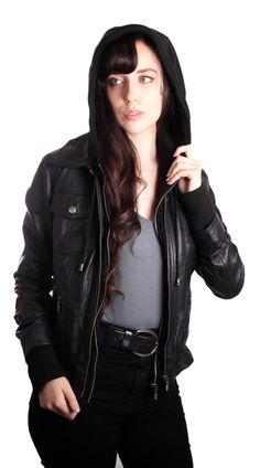 Women's leather jacket with a hoody. Slim-fit women's leather jacket. Zippered mid-section. Detachable Mid-Section cotton fleece with hoodie hoodie. Two exterior pockets with flaps. Rib on wrists and waistline. Soft, supple leather Genuine leather. This women's leather jacket is soft, warm, and comfy. You will be looking classy and snug through the winter months in this leather jacket. Two Front Snap Button Chest Pockets Two Lower Diagonal Zippered Hand Warmer Pockets Zippered Removable inner Mi Fitted Leather Hooded Jacket With Long Sleeves, Fitted Leather Jacket With Detachable Hood For Fall, Winter Leather Jacket With Double-lined Hood, Fitted Leather Hooded Jacket For Fall, Winter Fitted Biker Jacket With Double-lined Hood, Leather Biker Jacket With Double-lined Hood, Winter Biker Jacket With Double-lined Hood, Fitted Leather Hooded Jacket With Double-lined Hood, Fitted Biker Jacket With Detachable Hood For Winter