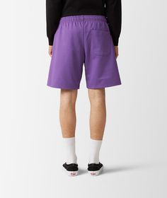 Comfortable and relaxed, these purple shorts are part of the SS23 collection by Rassvet. Crafted in a soft cotton fleece, they feature a green Rassvet logo on the left leg, an elasticated drawstring waistband and a back patch pocket. Men Logo, Purple Shorts, Back Patch, Cotton Fleece, Drawstring Waistband, Patch Pocket, ? Logo, Knitting, Purple