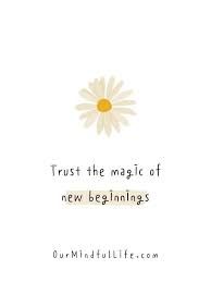 a white card with the words trust the magic of new beginnings and a yellow flower