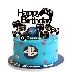 a blue birthday cake with video game controllers on top and happy birthday sign in the middle