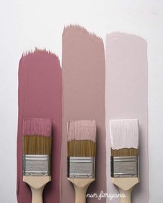 three paintbrushes with different shades of pink