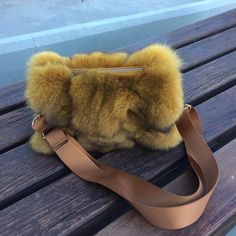 Yellow fox fur bag. A bag for all times and all ages. Small, cute and soft fox fur, it can be combined with any style of clothing. Inside with a small cupboard and open space for your things. Despite its size, it has enough capacity. A great purchase option that will not disappoint you At your disposal for any question. Brown Sheepskin Bags For Winter, Rectangular Faux Fur Shoulder Bag With Fur Lining, Chic Faux Fur Fluffy Shoulder Bag, Winter Bag With Faux Fur Lining, Brown Sheepskin Bag With Faux Fur Lining, Winter Brown Faux Fur Shoulder Bag, Fluffy Brown Winter Bags, Brown Faux Fur Bags With Faux Fur Lining, Brown Faux Fur Rectangular Shoulder Bag