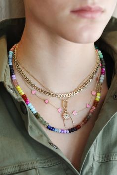 J. Landa Jewelry Add our Bora Bora necklace to your #neckmess for a beachy, vacation vibe. 6mm mixed gemstones - rose quartz, opal, rhodocrosite, turquoise, blue/green opal, lapis, sodalite, lemon quartz, yellow/pink chalcedony, green onyx, sunstone, green/pink quartz gold-filled accent beads Sequence/color of stones will vary knotted on silk thread each length has a 2" extension Rainbow Multi-strand Jewelry For Gifts, Rainbow Beaded Chain Jewelry For The Beach, Bohemian Jewelry With Heart Beads For Everyday, Rainbow Sapphires, Lock Necklace, Pink Agate, Green Opal, Station Necklace, Lemon Quartz