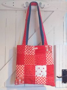 This tote bag is called Cherry pie. A lovely summery bag with a pop of colour.  Made from quilted patchwork cotton prints in cute cotton designs this bag is reversible with the other side in blue denim. A patch pocket on the denim side for small items and handles to match the bag gives this a Boho look. All fabrics are upcycled, eco friendly and machine washable. Measuring 35cm by 35cm Each one of my bags are uniquely made and make lovely gifts 💕 Robin Photos, Gifts Bags, Quilted Patchwork, My Bags, Stitch Pictures, Cross Stitch Pictures, Denim Tote, Cherry Pie, Fabric Bags