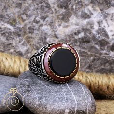 Men's onyx gemstone puzzle statement ring which will give you a head turning presence. This mystic, vintage style, engraved ring has a unique design for the polished, refined, and distinguished man. Perfect for casual and formal events, it will make your friends envious as you walk into the room full of confidence and pride. Looking for a unique, one of a kind GIFT FOR HIM, groomsman gift, father's day gift, teacher day gift? Look no further. This cool gemstone ring is the right answer and best Black Ring With Inlay, Black Rings With Inlay, Black Inlay Round Ring, Black Engraved Ring For Collectors, Black Engraved Rings For Collectors, Elegant Black Rings With Inlay, Collectible Black Engraved Rings, Black Engraved Round Ring, Unique Black Round Signet Ring