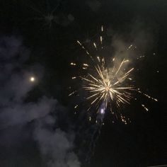 fireworks are lit up in the night sky