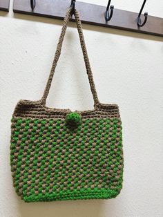 It is a double color crochet shoulder bag. It will be a great gift. Green Crochet Tote Straw Bag, Green Crochet Straw Tote Bag, Green Square Crochet Bag For Gift, Green Square Crochet Bag As Gift, Green Crochet Bag For Daily Use, Green Rectangular Crochet Bag For Daily Use, Green Crochet Shoulder Bag For Daily Use, Handmade Green Crochet Shoulder Bag, Green Casual Crochet Bag Hand Knitted