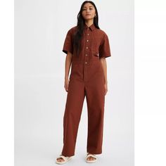 Meet The Throw-On-And-Go, One-And-Done Workwear Outfit That Will Soon Become Your Uniform. Our Short Sleeve Boiler Suit Has It Allfeaturing An Elastic Waist, Two Front Patch Pockets, An Internal Drawstring And Our Signature Red Tab, You Can Always Wear It Solo, Or Over A Long Sleeve T-Shirt On Cooler Days. This One Works Well With Every Season. A Throw-On-And-Go, One-And-Done Workwear Outfit Cut With A Slightly Roomier Silhouette For A Relaxed Fit Featuring An Elastic Waist, Two Front Patch Pock Work Coveralls For Women, Work Coveralls, Levis Pants, Boiler Suit, Levi Shorts, Clothing Ideas, Long Sleeve T Shirt, Pant Jumpsuit, Jumpsuit Romper