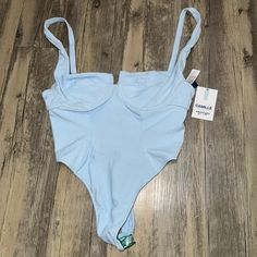 Light Blue One Piece Swimsuit From The Camille Collection With The Brand Swimsuits For All. Iconic Underwire One Piece With Tie Back And Adjustable Straps. New With Tags, Never Worn And Lining Is Still On The Suit. Size Medium. Offers Welcome, Grab It For The Summer! Blue Underwire Bodysuit With Lined Body, Fitted High Waist Blue Bodysuit, Fitted High Waist Bodysuit For Poolside, Fitted Light Blue Bodysuit For Beach Season, Chic Blue Bodysuit For Poolside, Blue Underwire Bodysuit For Summer, Light Blue Fitted Bodysuit For Poolside, Chic Blue Bodysuit For Pool, Chic Fitted Light Blue Swimwear