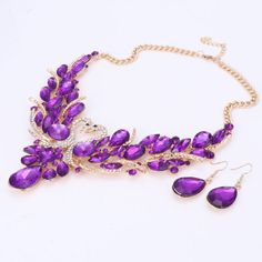 Purple Costume Jewelry For Wedding, Purple Jeweled Wedding Necklace, Purple Jeweled Jewelry For Wedding, Purple Wedding Jewelry With Jewels, Purple Party Jewelry, Purple Crystal Jewelry Set For Party, Elegant Purple Rhinestone Necklace For Party, Purple Costume Jewelry For Party, Purple Jeweled Necklace For Party