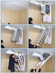 a woman is working on some kind of wall mounted rack with clothes hanging from it