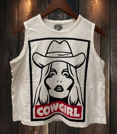 COWGIRL MUSCLE CROP TOP Cotton Muscle Tee For Summer, Cotton Vest With Graphic Print For Spring, Trendy Racerback Cotton Tank Top, Trendy Cotton Racerback Tank Top, Spring Graphic Tee Sleeveless Top, Trendy Cotton Crew Neck Tank Top, Cotton Graphic Print Tank Top, Graphic Print Cotton Tank Top, Cotton Racerback Muscle Tee With Graphic Print