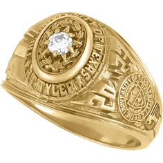 a gold ring with a white diamond in the center and two letters on each side