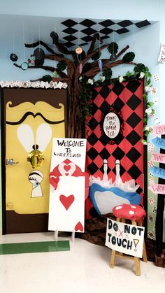 the front door is decorated with signs and decorations