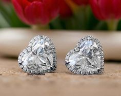 8.50 mm Dazzling Diamond Stud Earrings, 5 TCW Heart Shape Halo Bridal Earrings, Comfortable With Screw Back, 18k White Gold Symbol Of Love  Detail about stones Moissanite & Simulated Stone: ----------------------------- Stone Shape : Heart Cut Stone Size : 8.50 mm Weight: 2.50 TCW Color: Colorless Cut: Excellent Clarity: VVS ✎ This is all our photography. This listing's image is only reference image. If you give me order then I will make this jewelry looks like listing's image ✿ Place your custom order here ☛ handmade moissanite made with festinating and brilliance. Stone is produced with excellent cuts, grades and superior quality. ☛ Metal Option: Silver/10KT/14KT/18KT ☛ Metal Tones: Yellow Gold, White Gold, Rose Gold   ✿ Stone type options: ☛ Natural Diamond, Lab-grown diamond, Precious Cubic Zirconia Heart Earrings For Wedding And Valentine's Day, Diamond White Heart-cut Earrings For Valentine's Day, Diamond White Heart Cut Earrings For Valentine's Day, Cubic Zirconia Heart Earrings For Wedding On Mother's Day, Diamond Heart Earrings For Wedding On Valentine's Day, Cubic Zirconia Earrings For Anniversary, Heart Cut Earrings With Prong Setting As Gift, Round Heart Earrings With Prong Setting For Wedding, Fine Jewelry Heart Earrings For Wedding On Valentine's Day