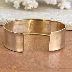 18KT polished yellow gold hammered + textured cuff bangle bracelet. Width: 19mm Weight: 23.79g Made in Italy 585/ 18KT purity Open cuff; fits small to large wrists Hammered Cuff Bracelet, Saint Jewelry, Anniversary Wedding Band, Cuff Bangle Bracelet, Gold Bracelets, Statement Bracelet, Large Crystals, Cuff Bangles, Gold Plated Sterling Silver