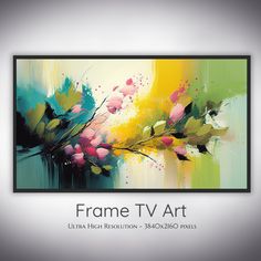 the frame tv art is hanging on the wall