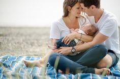 four pictures of people holding and kissing each other in different poses, with one woman sitting on the ground